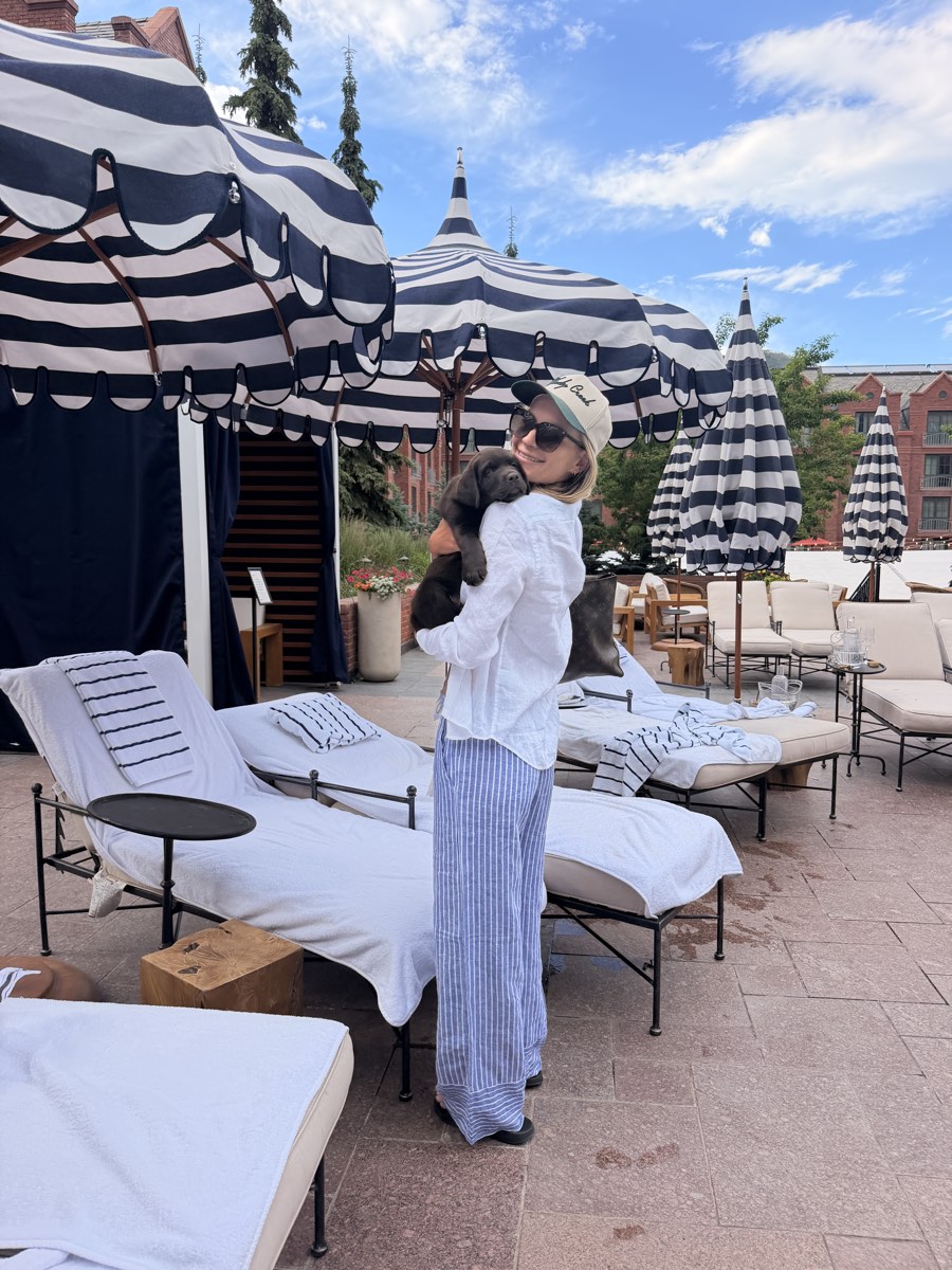Jess Eymann, founder of JAE Luxury Travel, poolside in Aspen